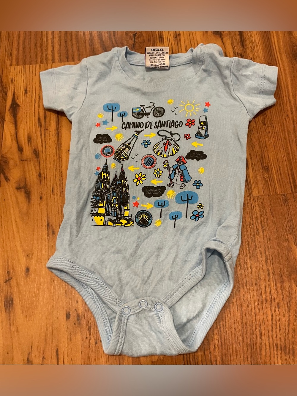 Light Blue Camino de Santiago Graphic One-Piece Baby Bodysuit